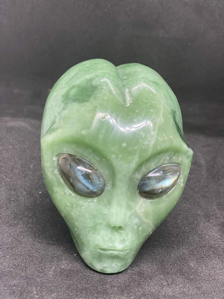 Green obsidian alien skull with labradorite eyes