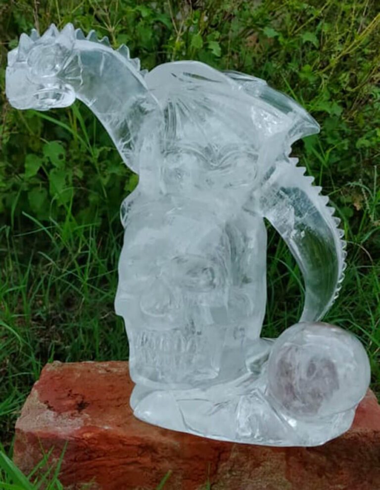 Winged dragon with crystal skull