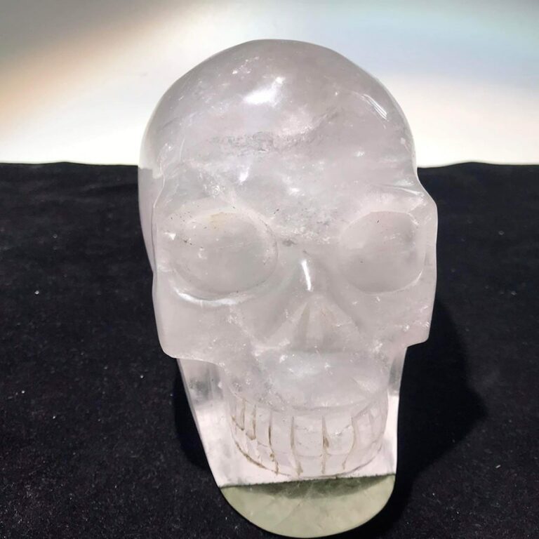 Rock crystal skull combined with green ghost quartz